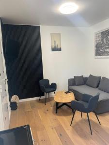 Posezení v ubytování Appartement moderne jolie cadre