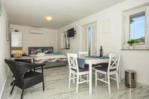 TV a/nebo společenská místnost v ubytování Studio Apartman Zlata