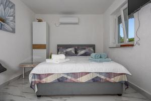 Postel nebo postele na pokoji v ubytování Studio Apartman Zlata