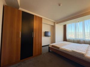 Postel nebo postele na pokoji v ubytování Nairi Hotel Yerevan