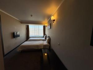 Postel nebo postele na pokoji v ubytování Nairi Hotel Yerevan