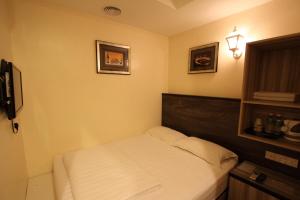 Postel nebo postele na pokoji v ubytování Shamrock Guest House