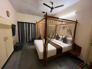 Postel nebo postele na pokoji v ubytování Kallal Resorts