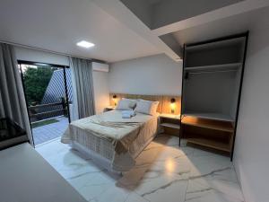 Katil atau katil-katil dalam bilik di Hotel e Cabanas Perau