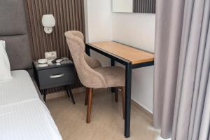 Postel nebo postele na pokoji v ubytování Hotel Lula Ksamil
