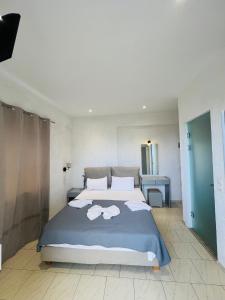 Posteľ alebo postele v izbe v ubytovaní Mark Hotel