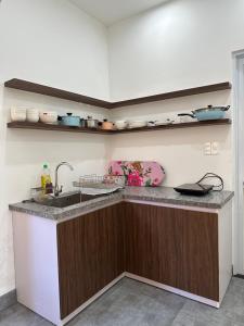 Køkken eller tekøkken på Nhà Lười + 35 billeder