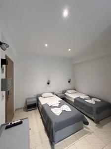 Posteľ alebo postele v izbe v ubytovaní Mark Hotel