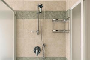 A bathroom at Lake Como Victoria Apartment
