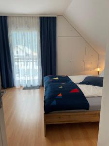 Postel nebo postele na pokoji v ubytování Haus Elvira + 37 fotografií