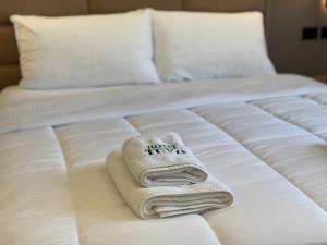 Postel nebo postele na pokoji v ubytování Hotel Tuyo