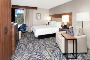Ένα ή περισσότερα κρεβάτια σε δωμάτιο στο Candlewood Suites Columbus North by IHG +36 φωτογραφίες