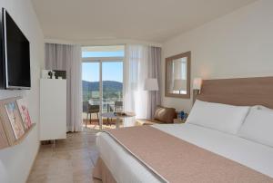 Postel nebo postele na pokoji v ubytování Meliá Calviá Beach
