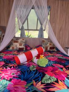 Letto o letti in una camera di Hei Maurua