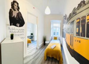 Ένα ή περισσότερα κρεβάτια σε δωμάτιο στο Central Lisbon rooms, top best location for tourists