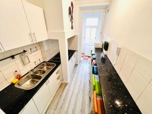 Η κουζίνα ή μικρή κουζίνα στο Central Lisbon rooms, top best location for tourists