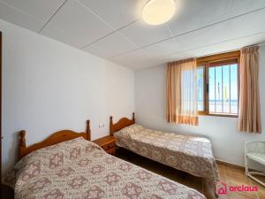 Postel nebo postele na pokoji v ubytování Tossalet 38