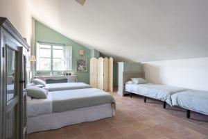 Postel nebo postele na pokoji v ubytování Hotel Boutique Moli El Canyisset
