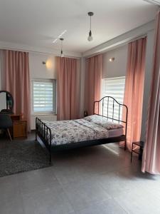 Postel nebo postele na pokoji v ubytování Apartamenty pod Wierzbami + 2 fotografie