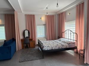 Postel nebo postele na pokoji v ubytování Apartamenty pod Wierzbami