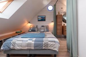Postel nebo postele na pokoji v ubytování Lofoten - Îlots de Merville