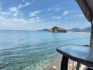 a view of the ocean from a boat at Apartments Lungo Mare in Sveti Stefan