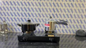 a blender sitting on top of a counter at Peaceful Studio With Kitchen & Terrace 301 in Patna