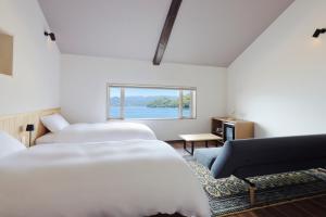 Letto o letti in una camera di 舟屋の宿鍵屋 別館おふくわけ