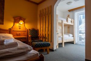 Voodi või voodid majutusasutuse Hotel Alpen Arnika toas