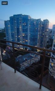 a view of a city at night from a balcony at 51 жемчужина Аркадія in Odesa