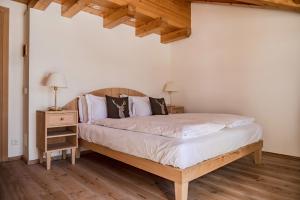 Postel nebo postele na pokoji v ubytování Chalet Cima Uomo