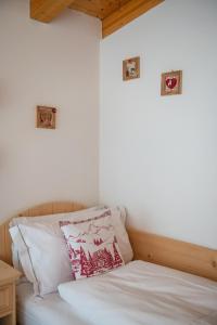 Postel nebo postele na pokoji v ubytování Chalet Cima Uomo