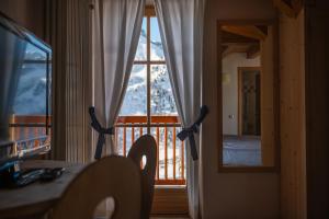 Fotografie z fotogalerie ubytování Chalet Cima Uomo v destinaci Passo San Pellegrino