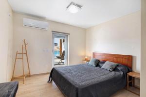 Ένα ή περισσότερα κρεβάτια σε δωμάτιο στο Numar Residence A C +24 φωτογραφίες