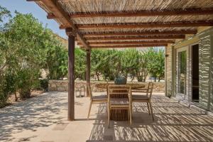 A garden outside Nikki Beach Resort & Spa Porto Heli