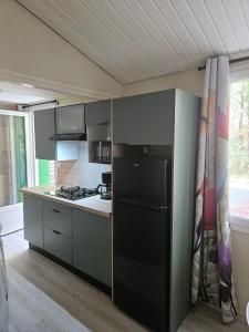 Kuchyň nebo kuchyňský kout v ubytování Cottage Confort 1 Ch