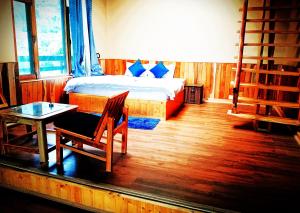 Shree Dev Narayan Hotel的休息区