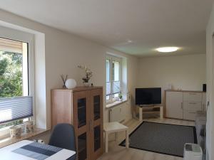 Un televizor și/sau centru de divertisment la Urlaub Und Zu Hause