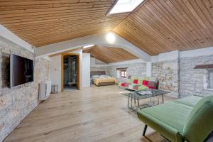 Χώρος καθιστικού στο Holiday House Vili
