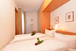 Posteľ alebo postele v izbe v ubytovaní Familienhotel Kleinwalsertal