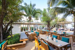 Ein Restaurant oder anderes Speiselokal in der Unterkunft Bann Pantai Resort 