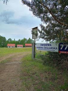 Certifikát, hodnocení, plakát nebo jiný dokument vystavený v ubytování Domy Trapera