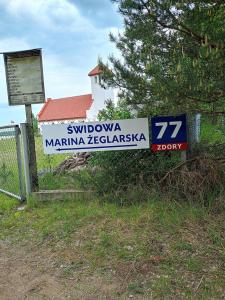 Certifikát, hodnocení, plakát nebo jiný dokument vystavený v ubytování Domy Trapera