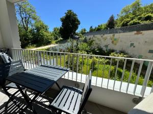 En balkon eller terrasse på Le Palmier