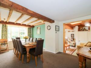 a dining room with a table and chairs at The Laurels in Bishops Castle
