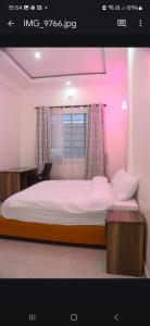 Ένα ή περισσότερα κρεβάτια σε δωμάτιο στο The Scion Garden