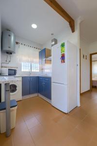 Kuchyň nebo kuchyňský kout v ubytování Hostal del Faro