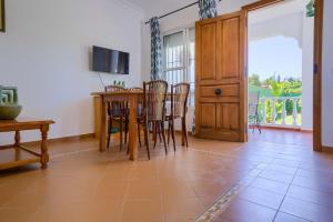 TV a/nebo společenská místnost v ubytování Hostal del Faro