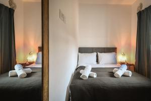 Postel nebo postele na pokoji v ubytování Stylish 2BR Apt w Balcony 5 min From Tel Aviv Port
