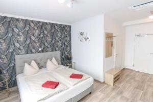 Postel nebo postele na pokoji v ubytování Second Home Hotel